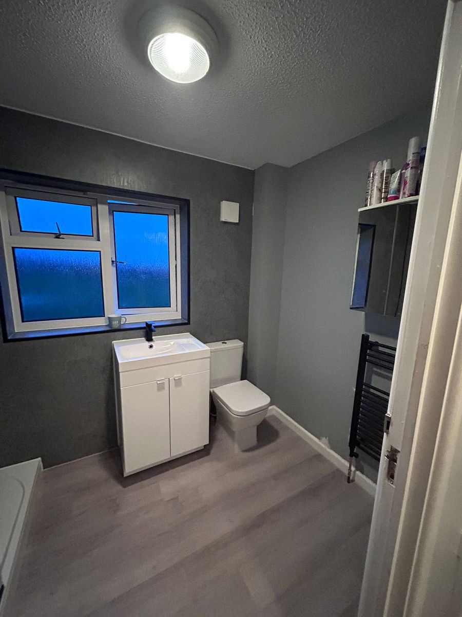 Bathroom with vanity unit